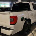 He left his brand-new pickup plugged in at the airport for two weeks : what he found at the gate cost him thousands